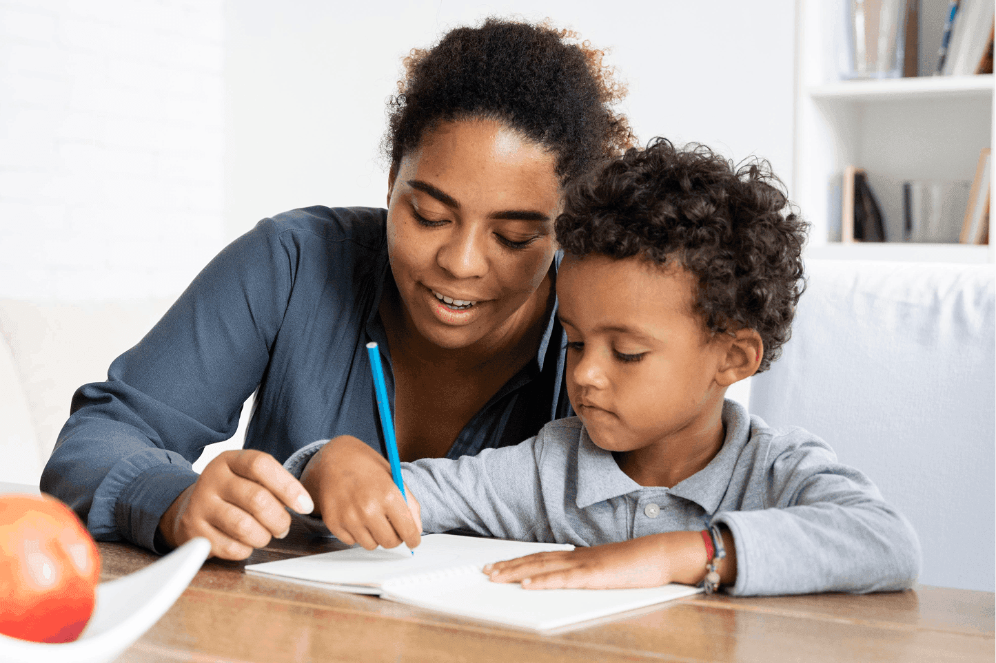 Mother teaching child