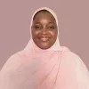 Professional headshot of Khadija Zubairu, smiling, suitable for tutoring profile.