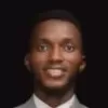 "Joshua Victor, a dedicated mathematics and junior physics teacher, sharing knowledge with students using clear, engaging explanations and visual aids."
